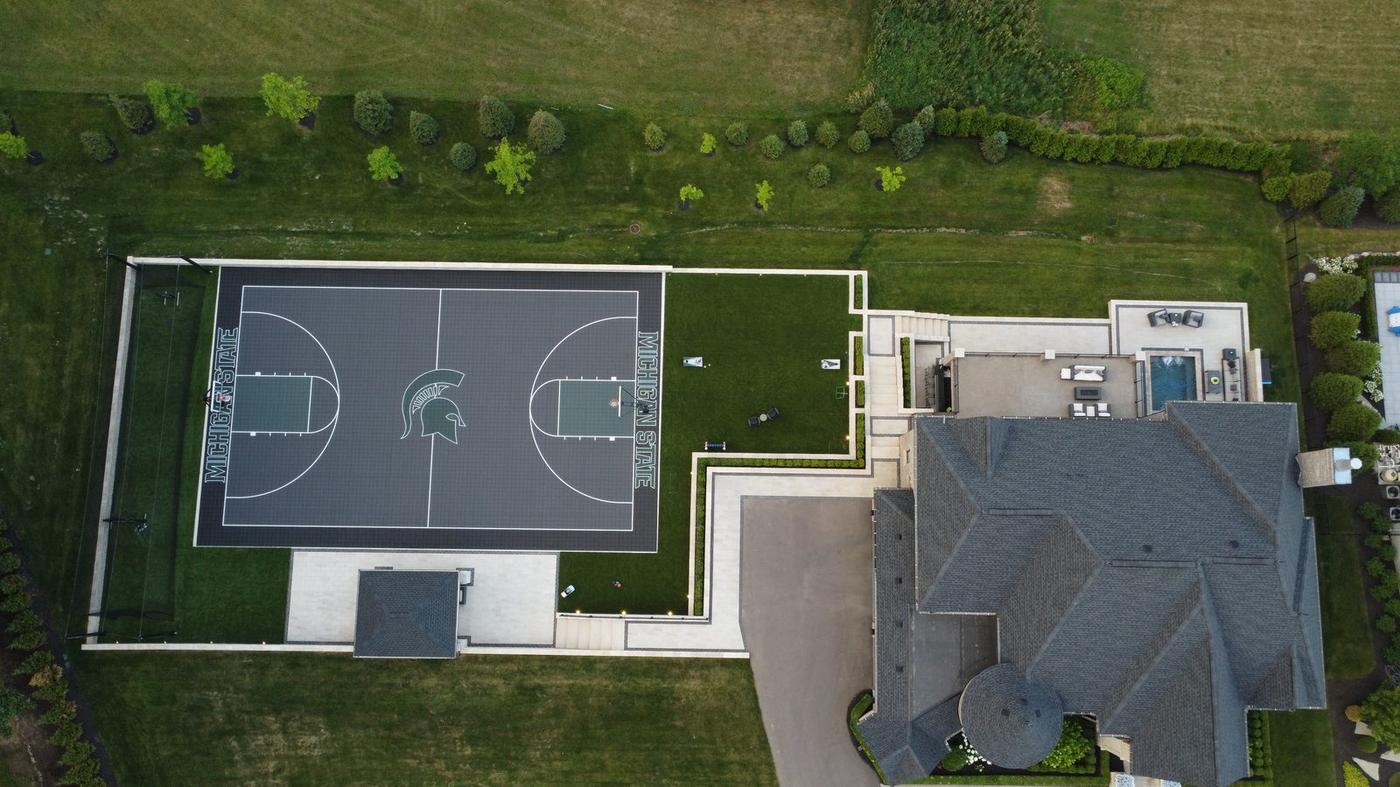 Premium backyard court with landscaping